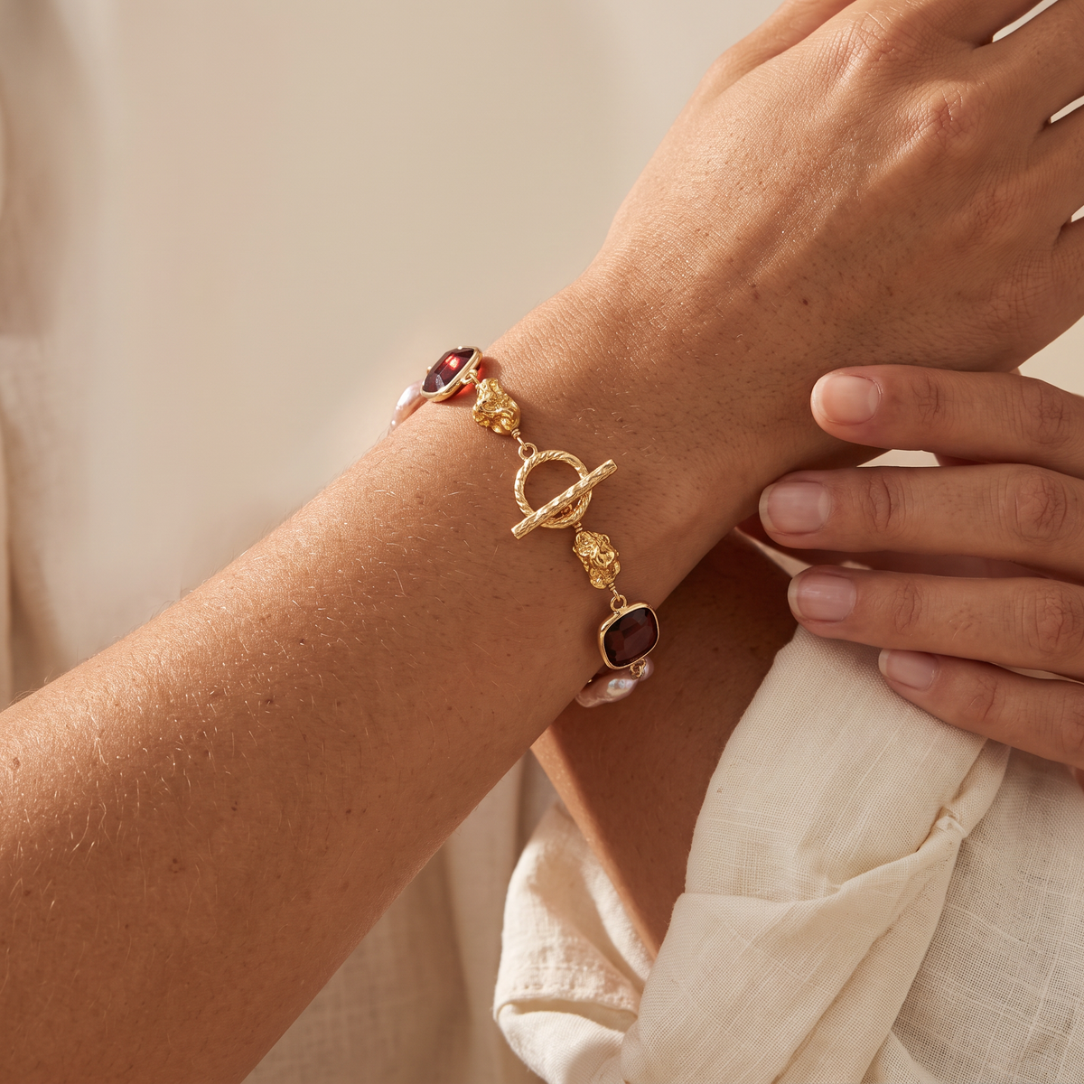 Midnight bracelet worn, hand at the sleeve