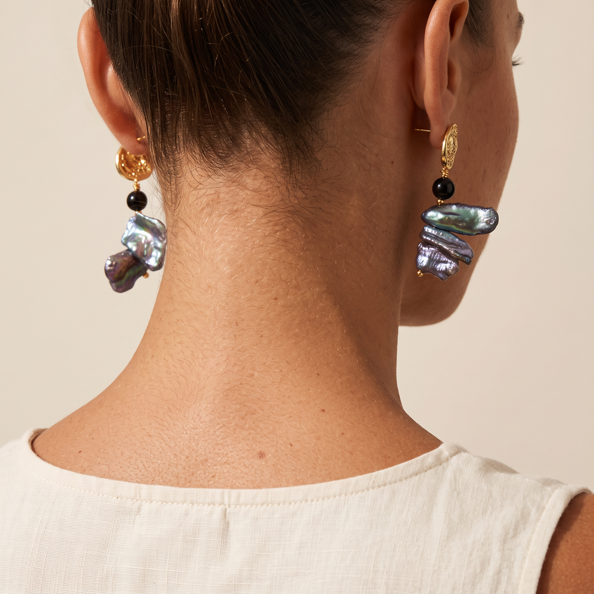 Deepwater Pearl earrings worn, seen from behind