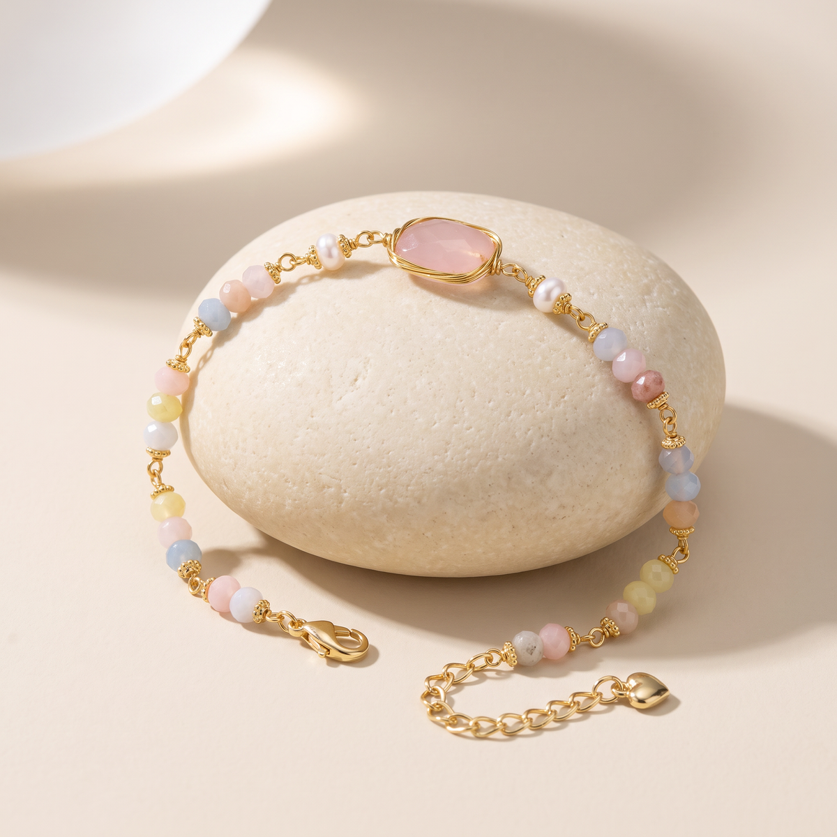 Still Water bracelet resting on a pale stone